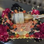 champanhe e frutos vermelhos